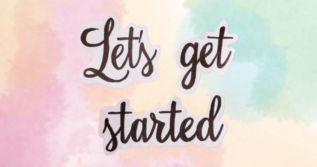 Get Started With Wealthy Affiliate Handwritten 'Let's Get Started' text on a pastel watercolor background, introducing Wealthy Affiliate's membership options and pricing plans for new users.